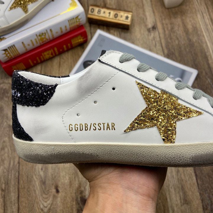 Golden Goose Gold / Black