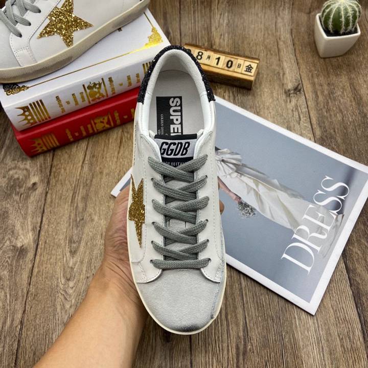 Golden Goose Gold / Black