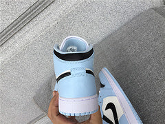 Air Jordan 1 Mid "University Blue"