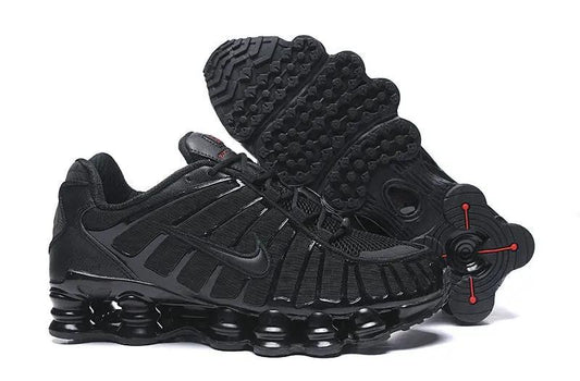 Crne Nike Shox tenisice s vidljivim stupićima ispod pete